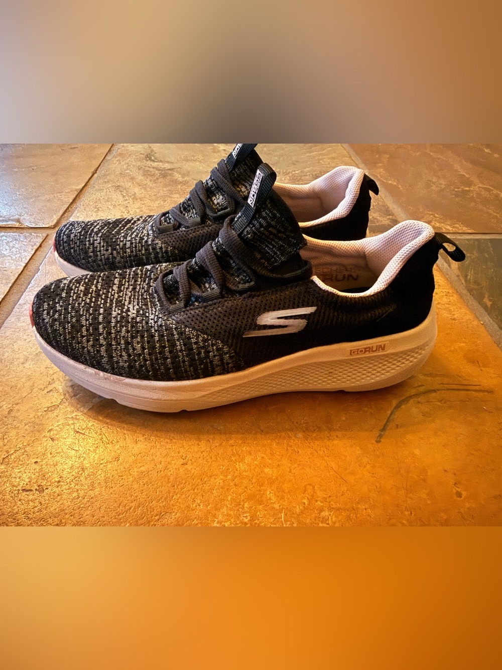 Skechers Woman’s Black and Pink GO RUN Knit Slip-On Sneakers
